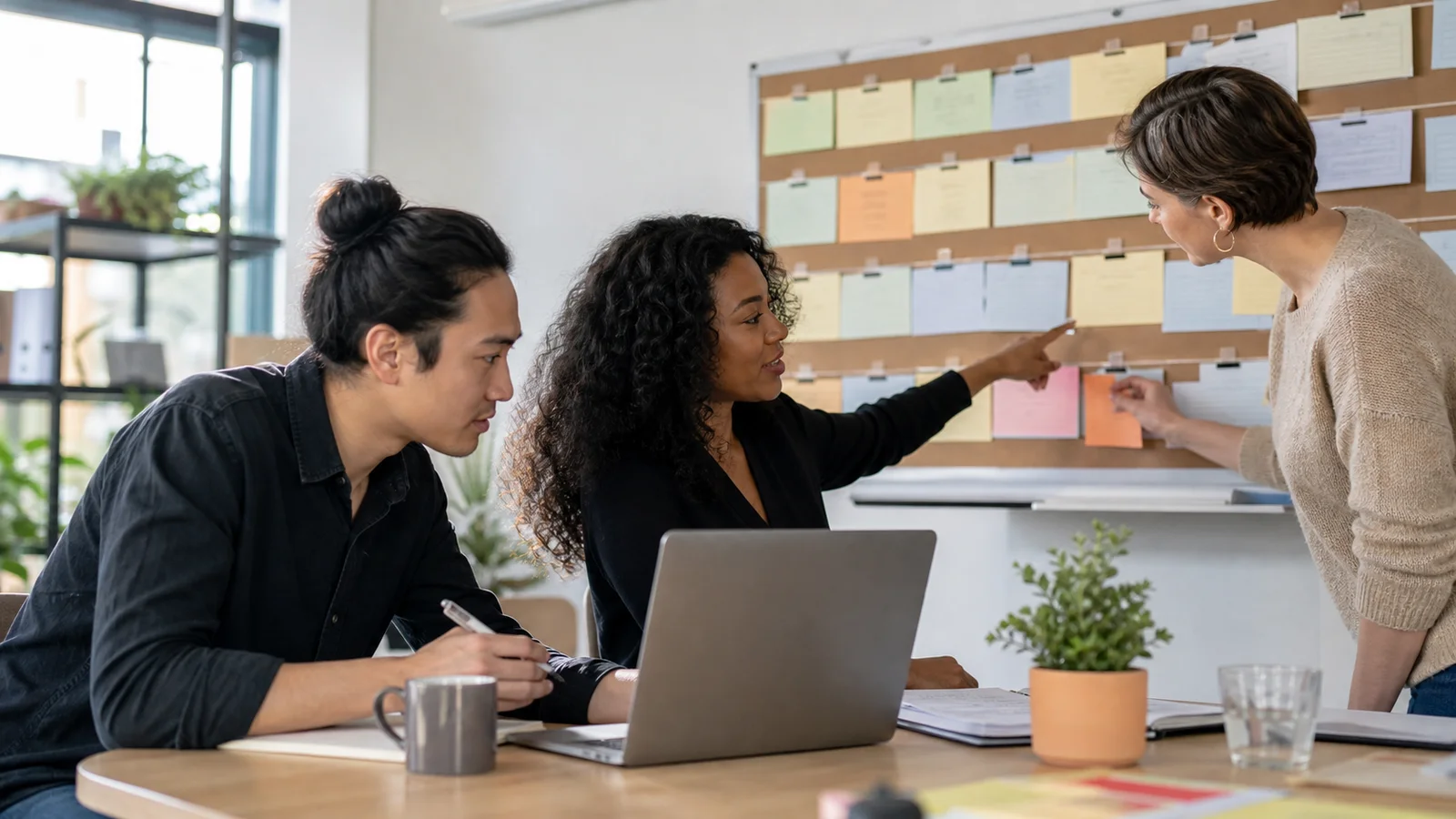 Small business manager and employees using AI project management to organize tasks on a project board