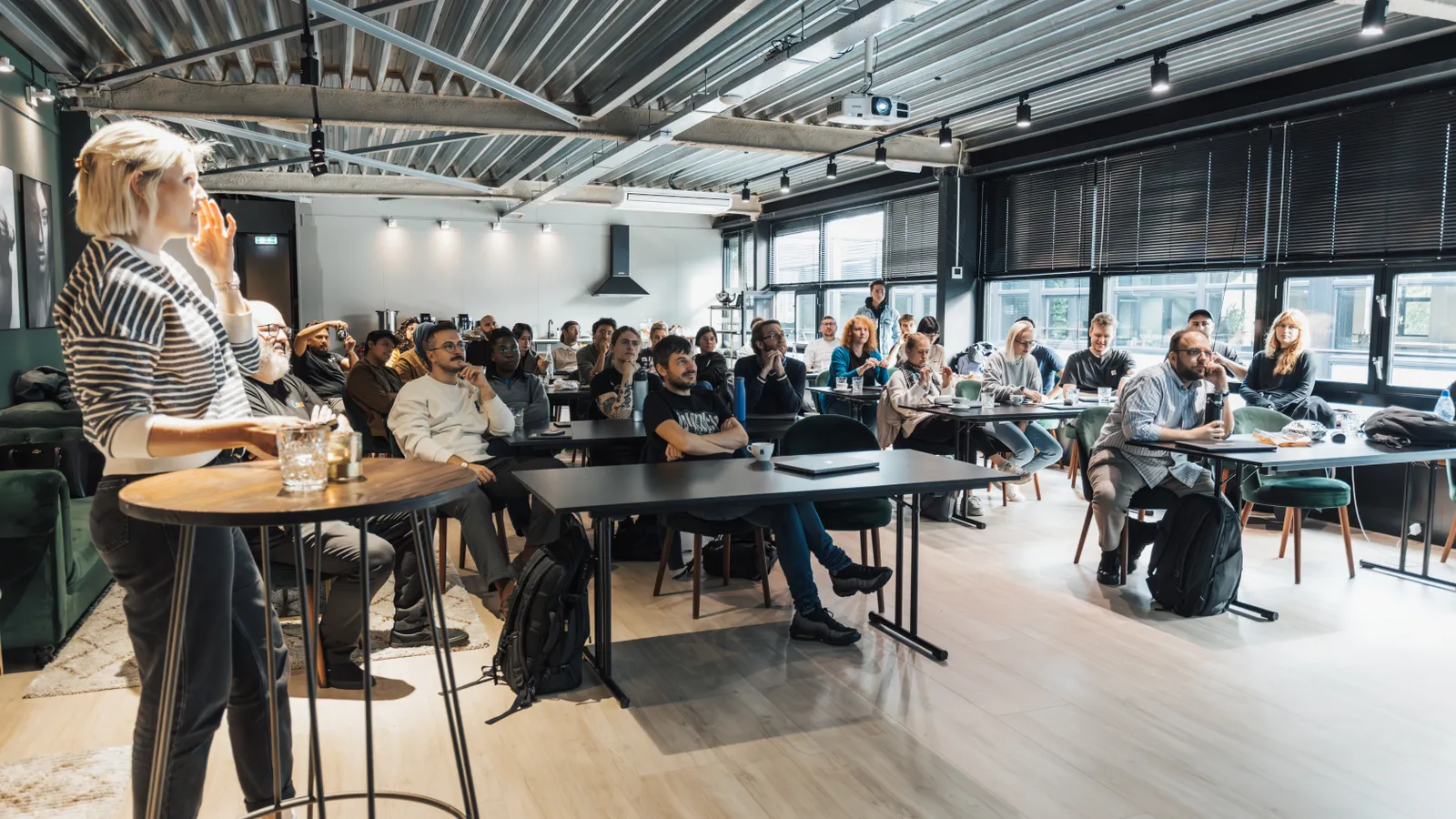 Business audience attending a live AI seminar and workshop