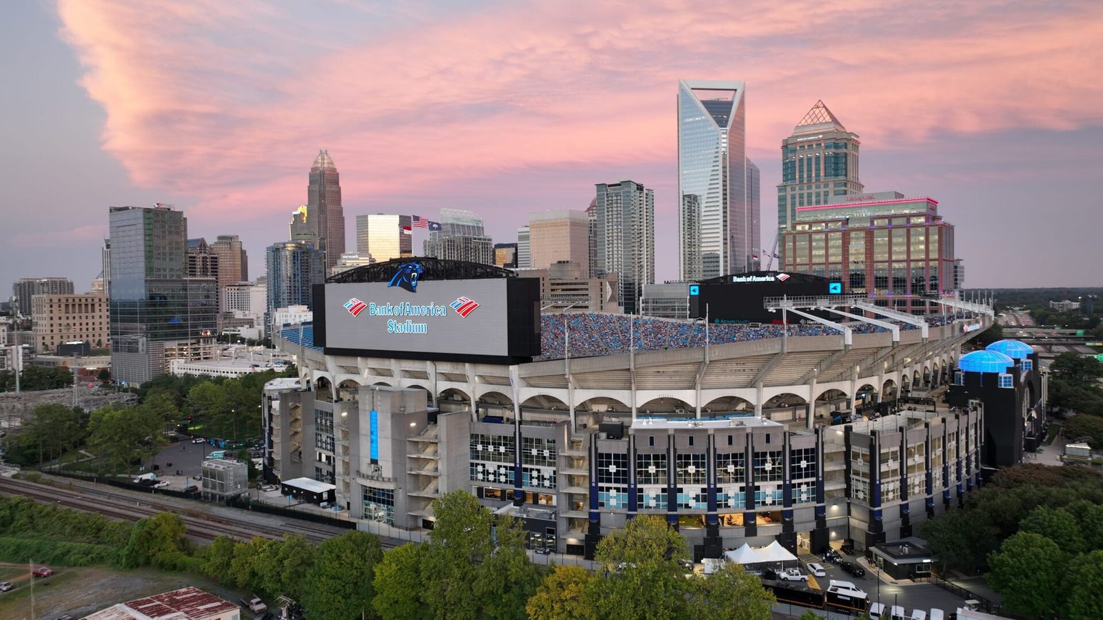 Winning With AI live seminar in Charlotte, NC near Uptown skyline and business districts